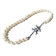 'Monochrome' classic freshwater pearl necklace with unique clasp