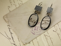 Oval postcard earrings with linear panels