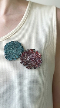 Brooch duo