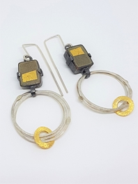 Gold square earrings.